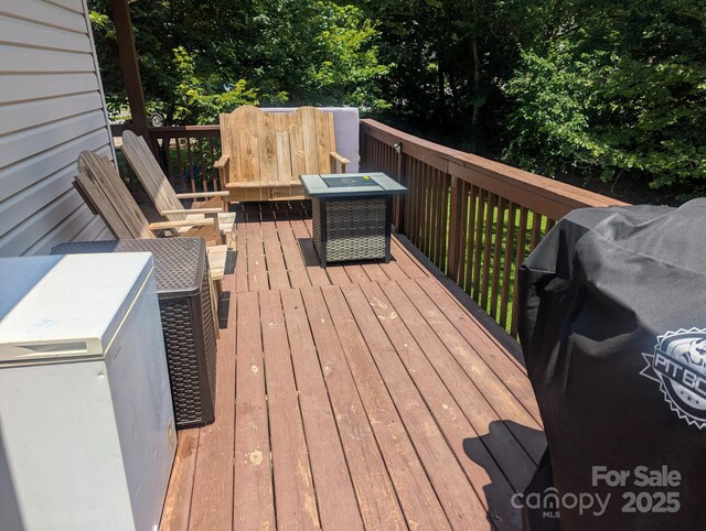 5077 Edney Ct, Granite Falls, NC 28630 - wooden terrace with area for grilling