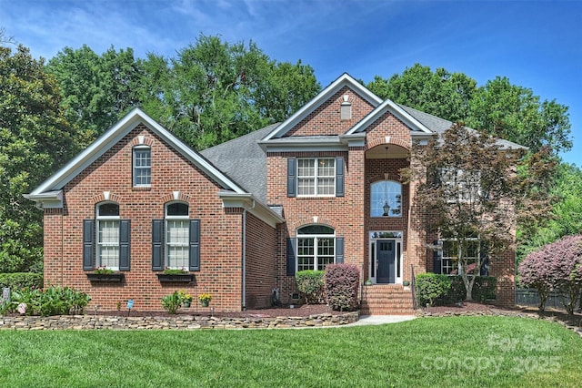 12644 Lahinch Ct, Charlotte, NC 28277 - colonial inspired home with brick siding and a front lawn
