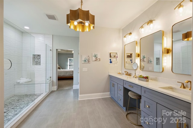 12644 Lahinch Ct, Charlotte, NC 28277 - full bath featuring double vanity, a chandelier, connected bathroom, and tiled shower