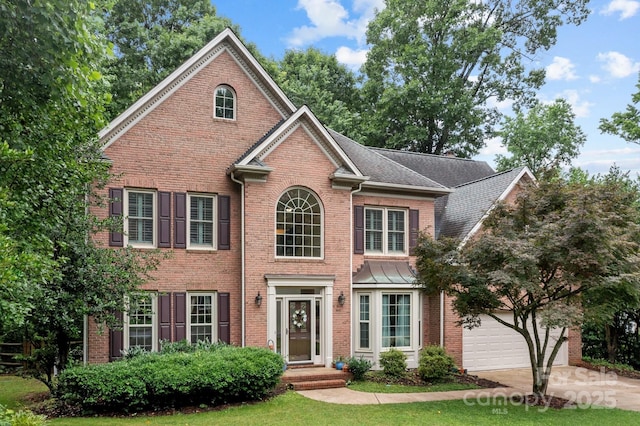 17433 Glassfield Dr, Huntersville, NC 28078 - view of front of home with brick siding, concrete driveway, and a front yard