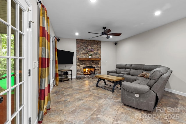 17433 Glassfield Dr, Huntersville, NC 28078 - living area with a ceiling fan, recessed lighting, stone finish flooring, and a fireplace