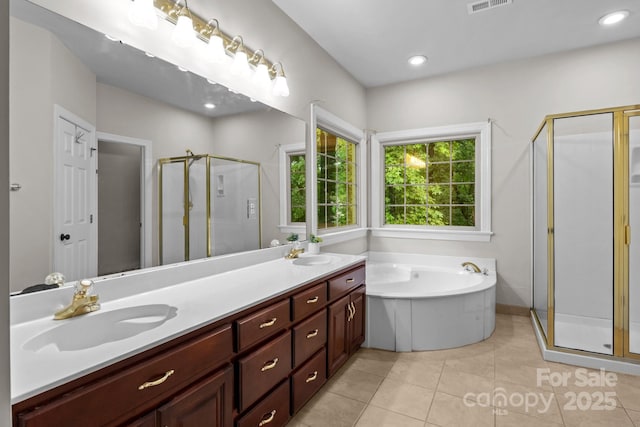 17433 Glassfield Dr, Huntersville, NC 28078 - full bath featuring a shower stall, double vanity, a garden tub, tile patterned floors, and recessed lighting