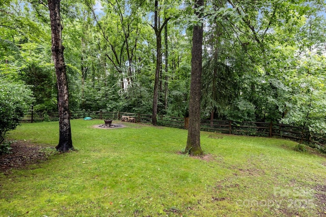 17433 Glassfield Dr, Huntersville, NC 28078 - fenced backyard with a fire pit
