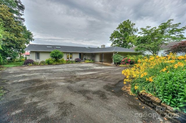 7945 Placid Ct, Denver, NC 28037 - single story home with driveway and a chimney