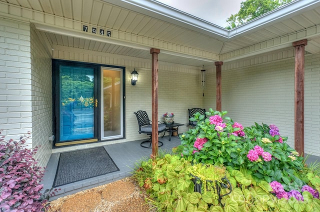 7945 Placid Ct, Denver, NC 28037 - property entrance with brick siding and covered porch
