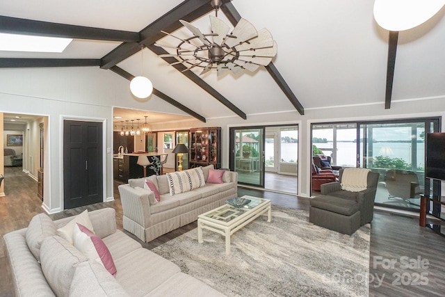 7945 Placid Ct, Denver, NC 28037 - living room with a chandelier, wood finished floors, and a skylight