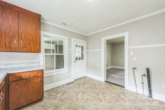 807 3rd St, Kings Mountain, NC 28086 - kitchen featuring light countertops and crown molding