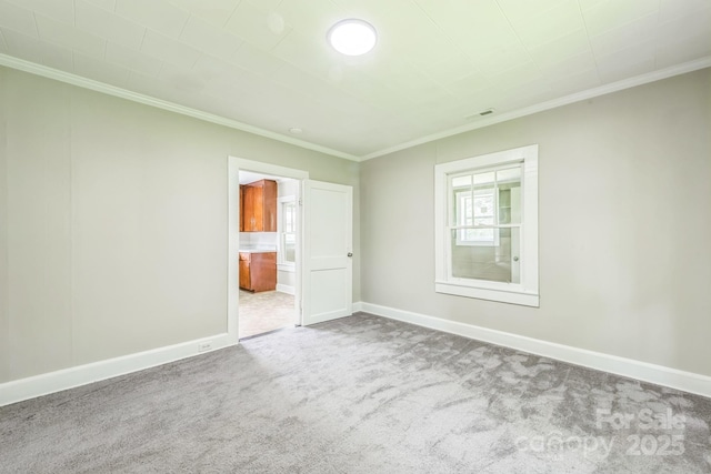 807 3rd St, Kings Mountain, NC 28086 - unfurnished bedroom with carpet floors, ornamental molding, and ensuite bath