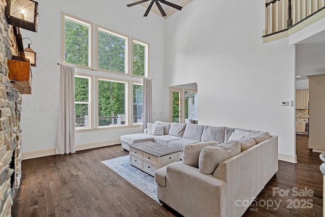 109 Walking Horse Trl, Davidson, NC 28036 - living area with a high ceiling, ceiling fan, healthy amount of natural light, and dark wood-style flooring