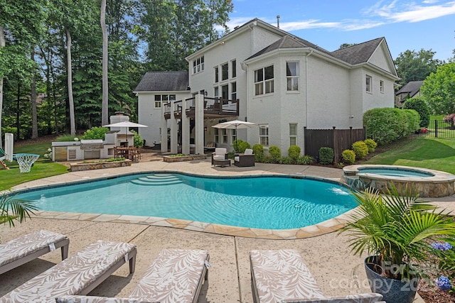 109 Walking Horse Trl, Davidson, NC 28036 - view of pool featuring a patio and a pool with connected hot tub