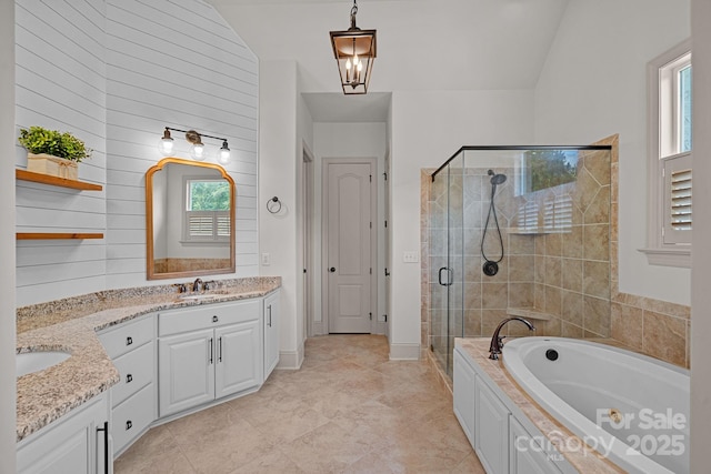 109 Walking Horse Trl, Davidson, NC 28036 - bathroom with a stall shower, vanity, a jetted tub, and wood walls