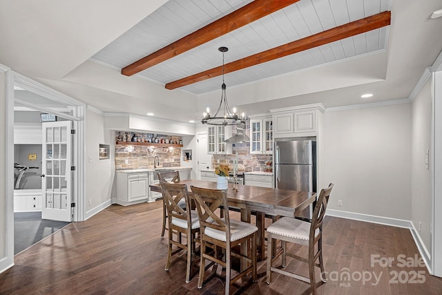 109 Walking Horse Trl, Davidson, NC 28036 - dining space featuring dark wood-style floors, bar with sink, recessed lighting, a chandelier, and a wooden ceiling with exposed beams
