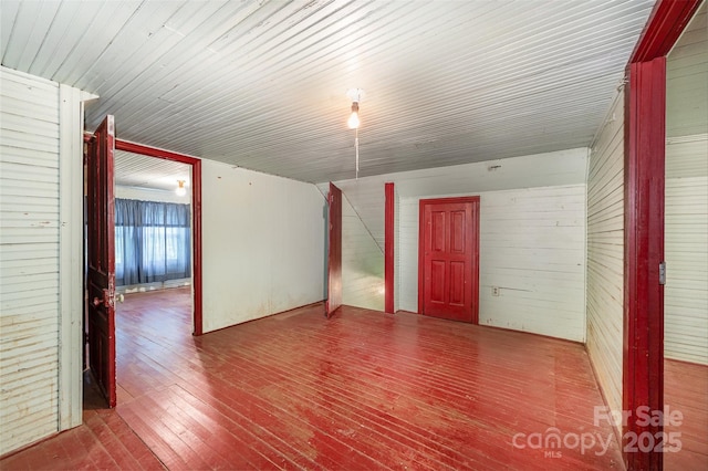 4612 Rehobeth Rd, Waxhaw, NC 28173 - empty room with hardwood / wood-style floors and wood walls