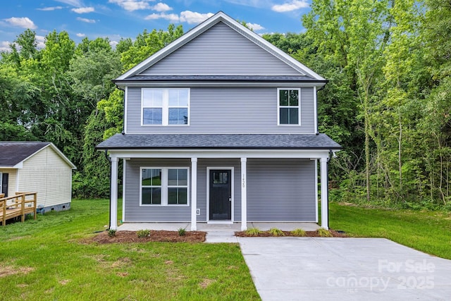 1420 Tyler St, Kannapolis, NC 28083 - view of front facade with a porch, a front yard, and a shingled roof