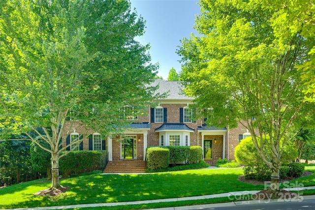 5008 Woodview Ln, Weddington, NC 28104 - view of front facade featuring a front lawn and brick siding