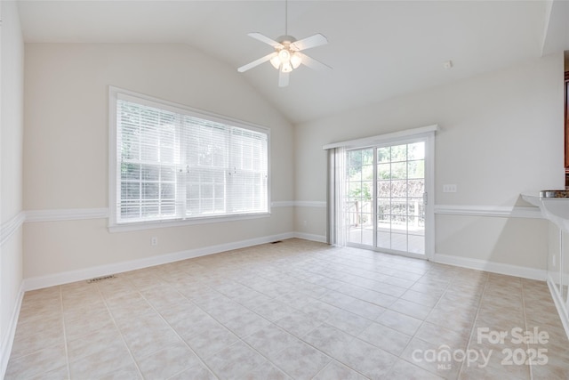 5008 Woodview Ln, Weddington, NC 28104 - empty room with light tile patterned floors, a ceiling fan, and lofted ceiling