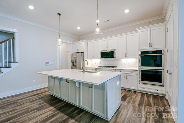 4714 Blanchard Way, Charlotte, NC 28226 - kitchen with appliances with stainless steel finishes, a sink, dark wood-style flooring, a center island with sink, and tasteful backsplash