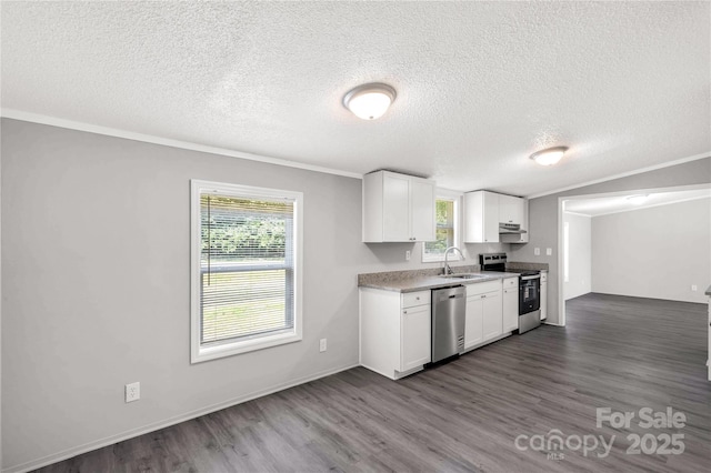 2007 Sugar Hill Rd, York, SC 29745 - kitchen featuring stainless steel appliances, a sink, a textured ceiling, light countertops, and dark wood-style floors