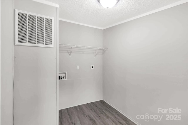 2007 Sugar Hill Rd, York, SC 29745 - washroom featuring hookup for a washing machine, wood finished floors, a textured ceiling, electric dryer hookup, and a heating unit