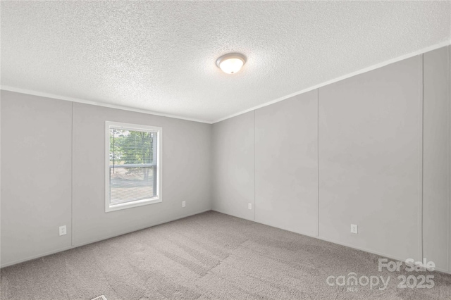 2007 Sugar Hill Rd, York, SC 29745 - carpeted spare room featuring a textured ceiling and ornamental molding