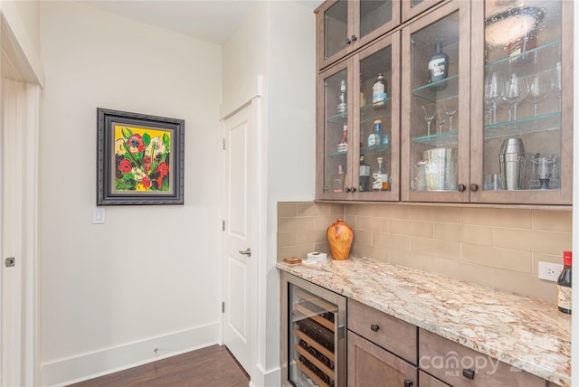 5 Farleigh St Unit 303, Asheville, NC 28803 - indoor dry bar with beverage cooler, dark wood-style flooring, and tasteful backsplash