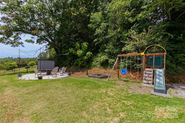 600 Old Mars Hill Hwy, Weaverville, NC 28787 - view of yard featuring an outdoor fire pit, a playground, and a patio area