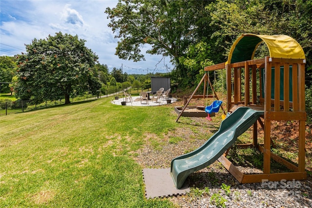 600 Old Mars Hill Hwy, Weaverville, NC 28787 - view of play area with an outdoor fire pit and a patio area