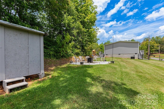 600 Old Mars Hill Hwy, Weaverville, NC 28787 - view of yard with an outdoor fire pit, an outdoor structure, and a patio