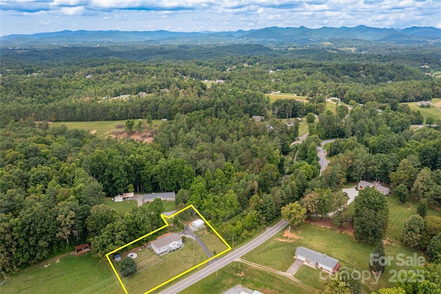600 Old Mars Hill Hwy, Weaverville, NC 28787 - aerial overview of property's location featuring property boundaries highlighted and a mountain backdrop