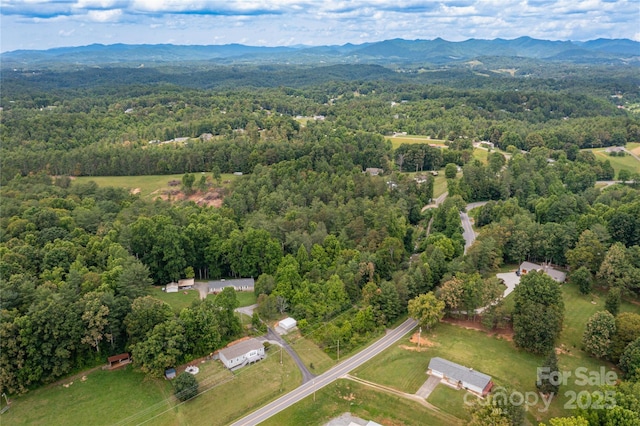 600 Old Mars Hill Hwy, Weaverville, NC 28787 - bird's eye view of a heavily wooded area and a mountain backdrop