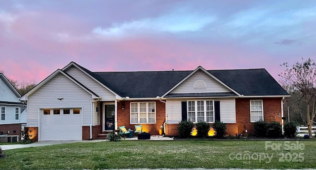 1700 Pickwick Ave, Kannapolis, NC 28083 - ranch-style house with brick siding, an attached garage, a front lawn, and entry steps