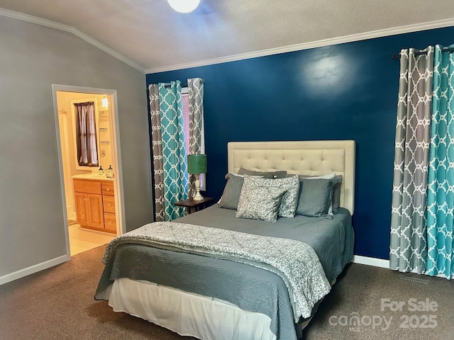 1700 Pickwick Ave, Kannapolis, NC 28083 - carpeted bedroom with crown molding, vaulted ceiling, baseboards, and connected bathroom