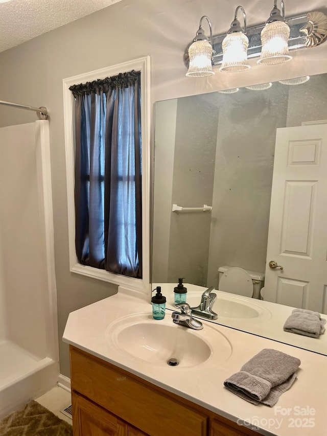 1700 Pickwick Ave, Kannapolis, NC 28083 - full bath with vanity, a shower, and toilet