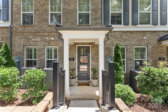 318 N Dotger Ave, Charlotte, NC 28204 - view of exterior entry with brick siding