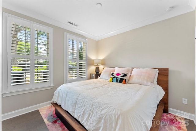 318 N Dotger Ave, Charlotte, NC 28204 - bedroom featuring baseboards and wood finished floors