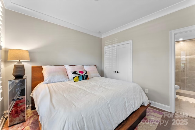 318 N Dotger Ave, Charlotte, NC 28204 - bedroom with ensuite bath and crown molding