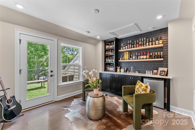 318 N Dotger Ave, Charlotte, NC 28204 - indoor dry bar with refrigerator, light wood finished floors, and recessed lighting