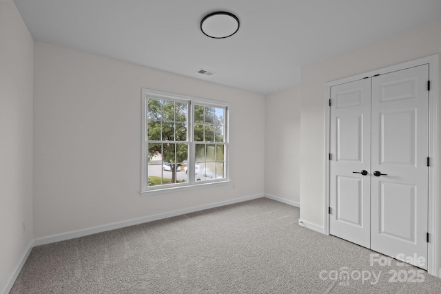 7213 Baniff Cir, Charlotte, NC 28277 - unfurnished bedroom featuring carpet flooring and a closet