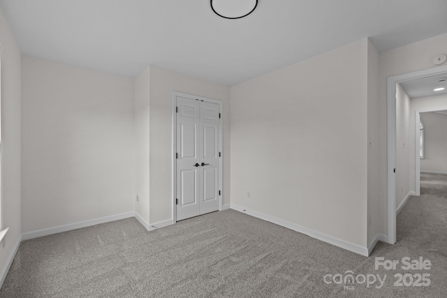 7213 Baniff Cir, Charlotte, NC 28277 - empty room with carpet floors and a smoke detector