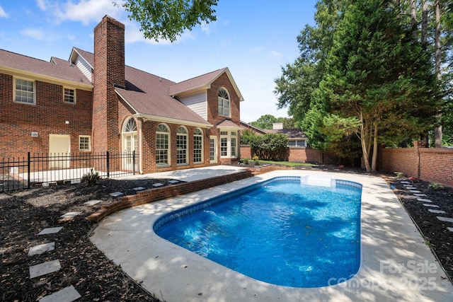 7213 Baniff Cir, Charlotte, NC 28277 - view of swimming pool featuring a patio and a fenced backyard