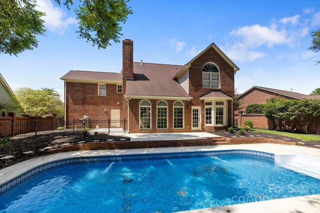 7213 Baniff Cir, Charlotte, NC 28277 - view of pool featuring a patio area and a fenced backyard