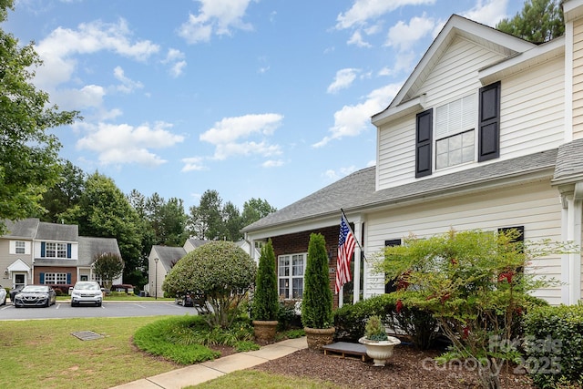 6103 Warrior Ave, Fort Mill, SC 29707 - view of front of home featuring a front lawn and a shingled roof