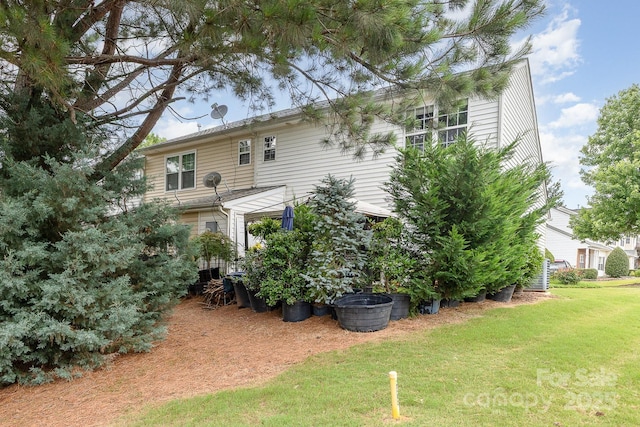 6103 Warrior Ave, Fort Mill, SC 29707 - back of house featuring a lawn