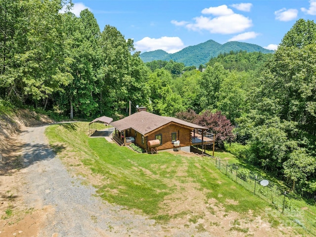 367 Robinson Rd, Clyde, NC 28721 - view of subject property with a heavily wooded area and a mountain backdrop
