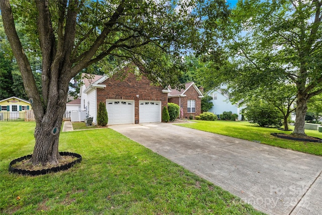 256 Rose St, Mooresville, NC 28117 - view of front of house with concrete driveway, brick siding, and a garage