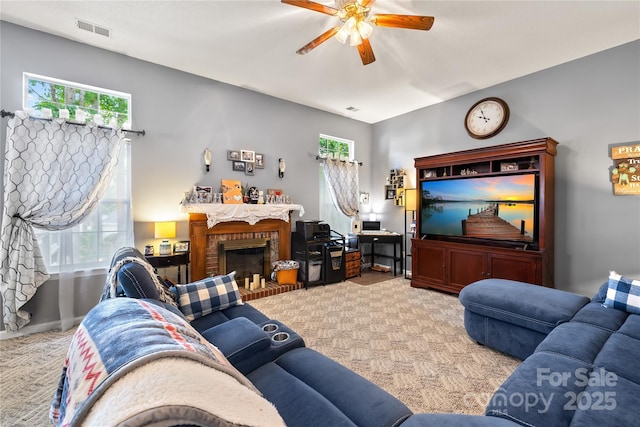 256 Rose St, Mooresville, NC 28117 - living room with a ceiling fan, carpet flooring, and a brick fireplace