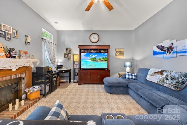 256 Rose St, Mooresville, NC 28117 - living area with carpet floors, a ceiling fan, and a fireplace
