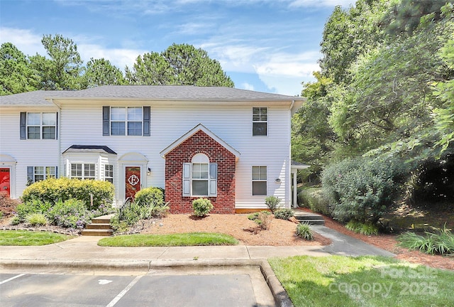 4263 Melrose Club Dr, Matthews, NC 28105 - view of front of house featuring uncovered parking and brick siding