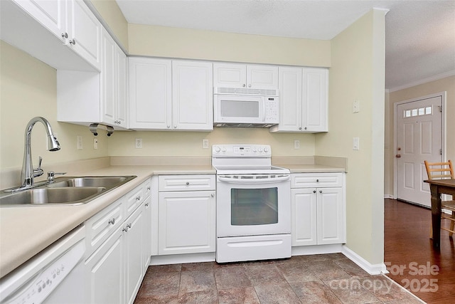 4263 Melrose Club Dr, Matthews, NC 28105 - kitchen with white appliances, white cabinets, light countertops, and ornamental molding