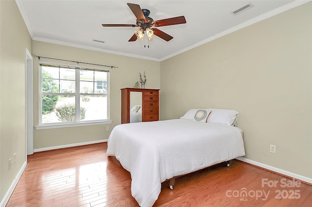 4263 Melrose Club Dr, Matthews, NC 28105 - bedroom featuring wood finished floors, crown molding, and a ceiling fan